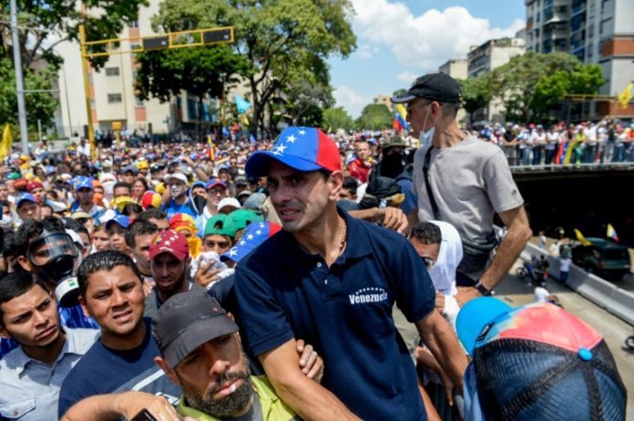 Partidos de oposición llaman a huelga en Venezuela contra reformas de Maduro