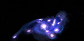 El James Webb y ALMA muestran una galaxia rotante con un enjambre de cúmulos estelares